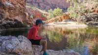 Relaxing by a waterhole on the Larapinta Trail |  Luke Tscharke